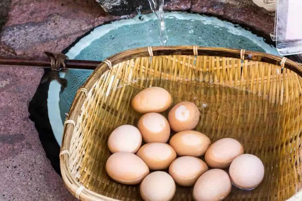 Cleaning eggs in a basket