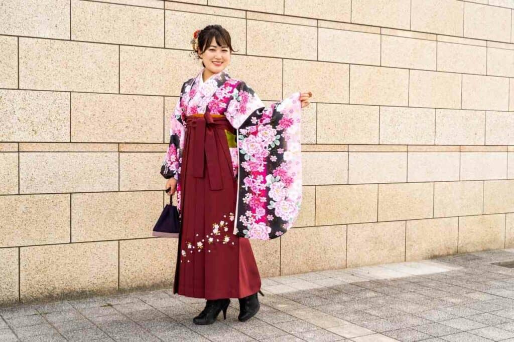 Japanese girl is wearing pink red hakama