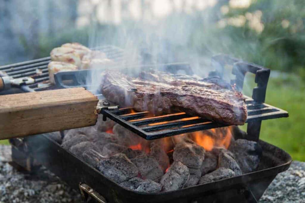 Hibachi grills meat and vegetables