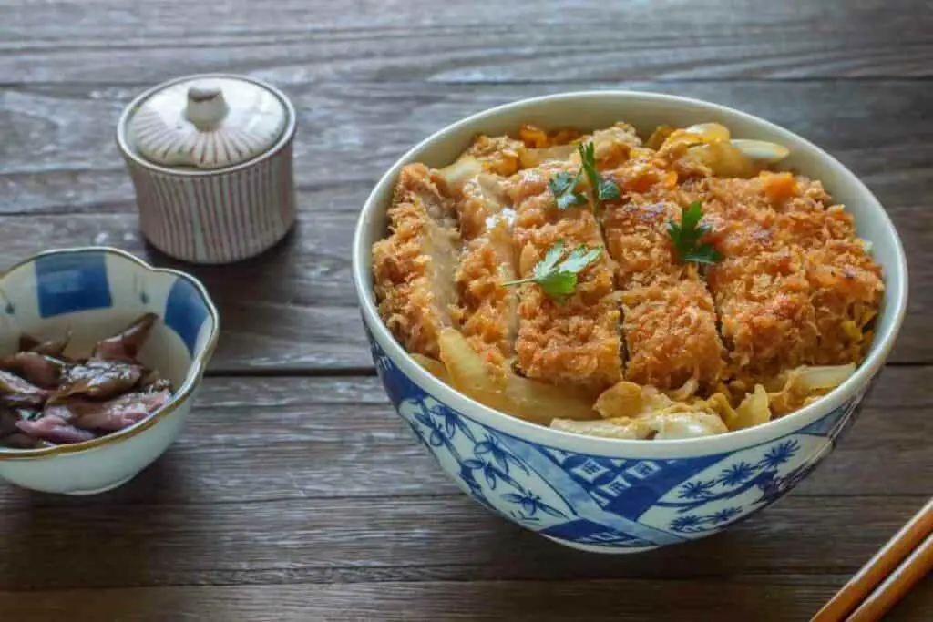 Katsudon served over a bowl of rice